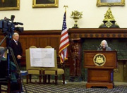 Judith Johnsrud (speaking) and Joseph Mangano